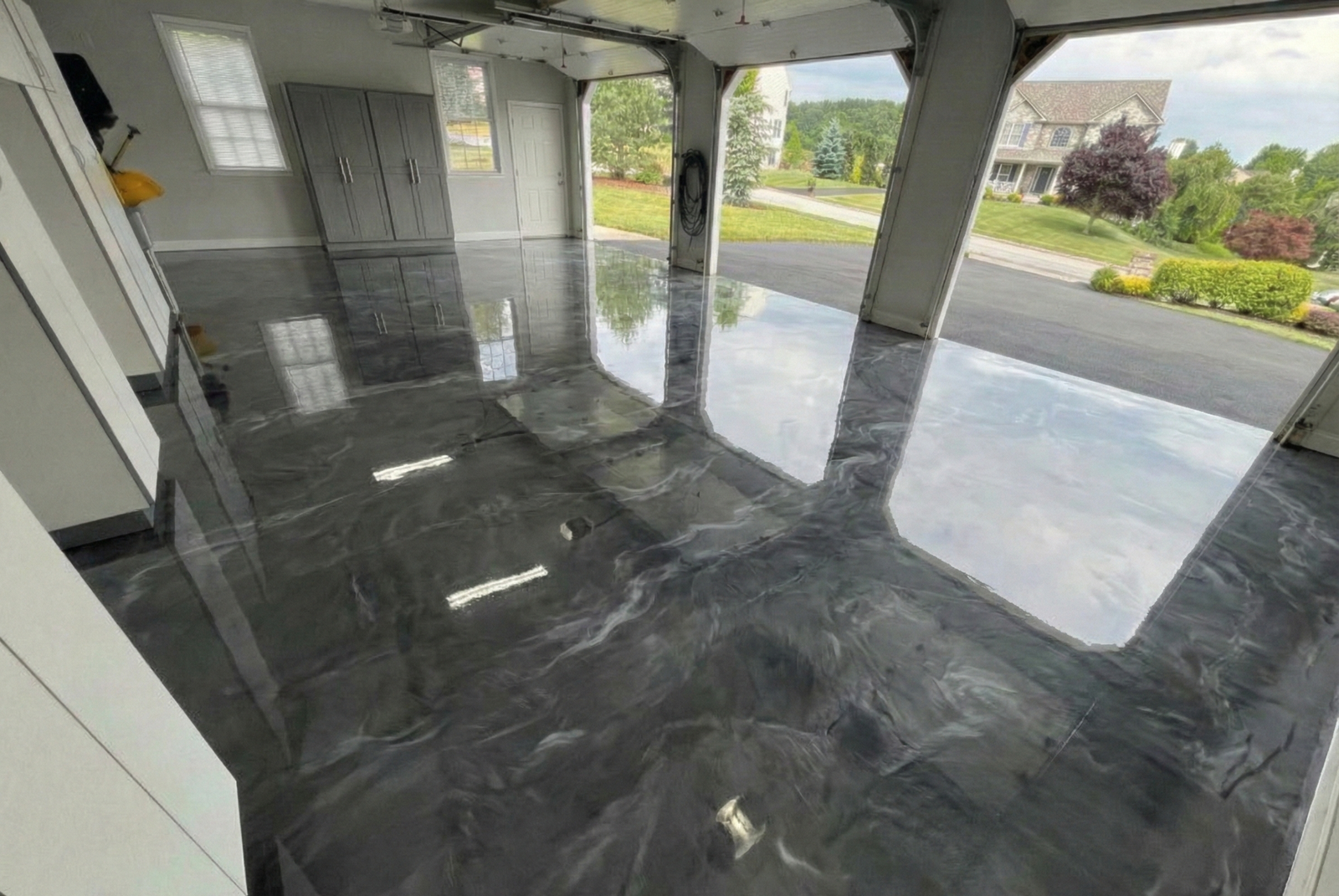 Gray metallic 3-car garage floor by PGC